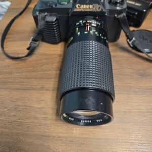 Canon Black SLR Camera with Textured Zoom Lens